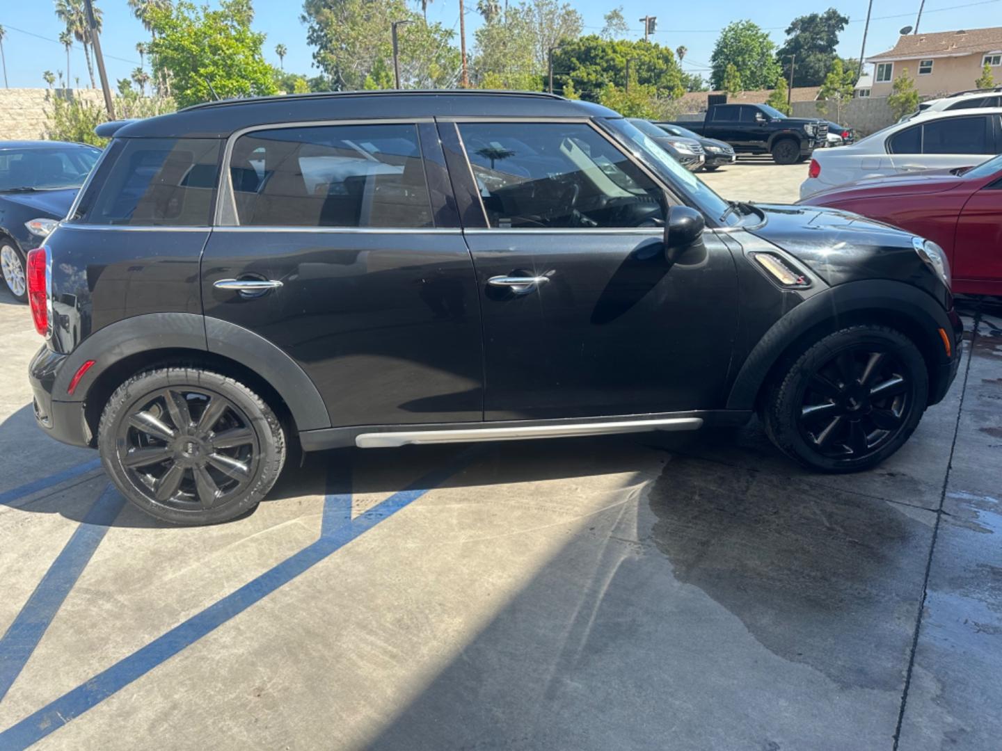 2015 Black /Black Mini Countryman S (WMWZC3C54FW) with an 1.6L L4 DOHC 16V TURBO engine, Automatic transmission, located at 30 S. Berkeley Avenue, Pasadena, CA, 91107, (626) 248-7567, 34.145447, -118.109398 - Photo#6